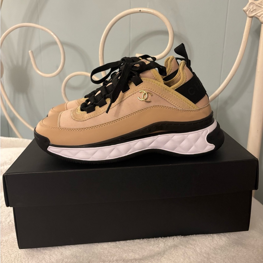 CHANEL Women's Sneakers in Black and Tan